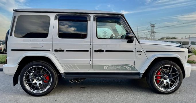 Used Mercedes-Benz G-Class AMG 63 AMG II (W463), 4.0 l, 2023 in Dubai by Saeed Auto, White color. Japanese Specs | AUTO.AE