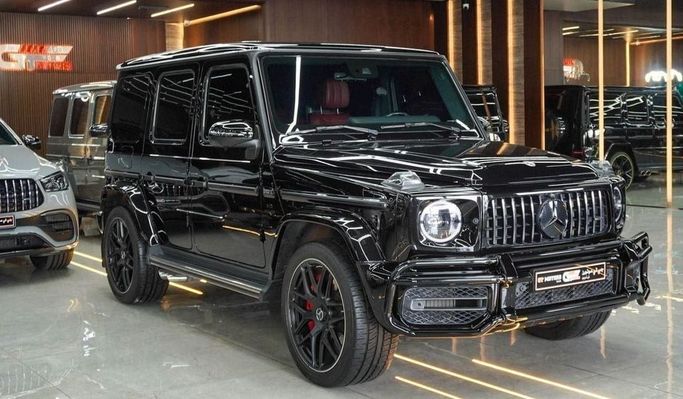 Подержанный Mercedes-Benz G-Class AMG 63 AMG II (W463), 4.0 л, 2023 в Дубае от Najem Motors Черный цвет. Европейская | AUTO.AE