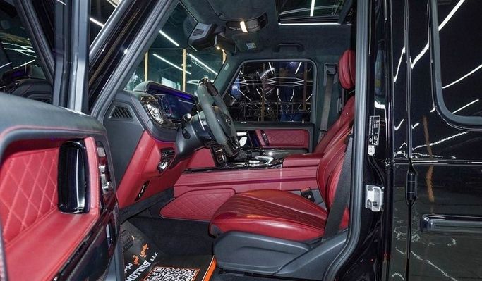 Подержанный Mercedes-Benz G-Class AMG 63 AMG II (W463), 4.0 л, 2023 в Дубае от Najem Motors Черный цвет. Европейская | AUTO.AE