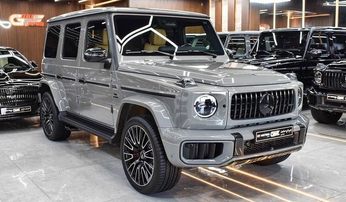 Новый Mercedes-Benz G-Class AMG 63 AMG II (W465) Рестайлинг, 4.0 л, 2025 в Дубае от Najem Motors Серый цвет. Европейская | AUTO.AE