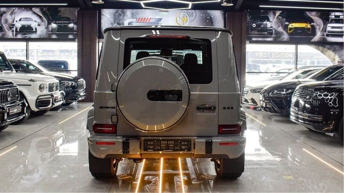 New Mercedes-Benz G-Class AMG 63 AMG II (W465) Facelift, 4.0 l, 2024 in Dubai by Najem Motors, Grey color. European Specs | AUTO.AE