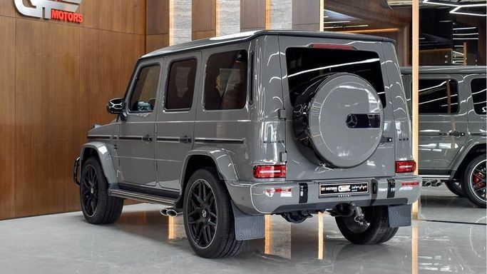 New Mercedes-Benz G-Class AMG 63 AMG II (W465) Facelift, 4.0 l, 2024 in Dubai by Najem Motors, Grey color. European Specs | AUTO.AE