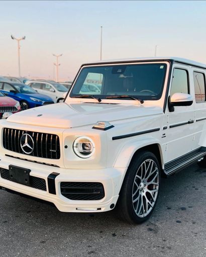Подержанный Mercedes-Benz G-Class AMG 63 AMG II (W463), 4.0 л, 2021 в Дубае от Lakhani Motors Белый цвет. Японская | AUTO.AE