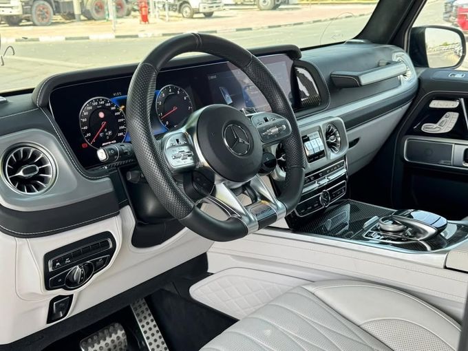Подержанный Mercedes-Benz G-Class AMG 63 AMG II (W463), 4.0 л, 2023 в Дубае от Lakhani Motors Синий цвет. Японская | AUTO.AE
