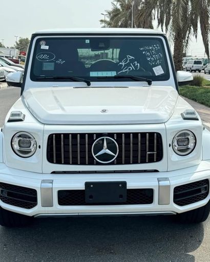 Подержанный Mercedes-Benz G-Class AMG 63 AMG II (W463), 4.0 л, 2023 в Дубае от Lakhani Motors Белый цвет. Японская | AUTO.AE