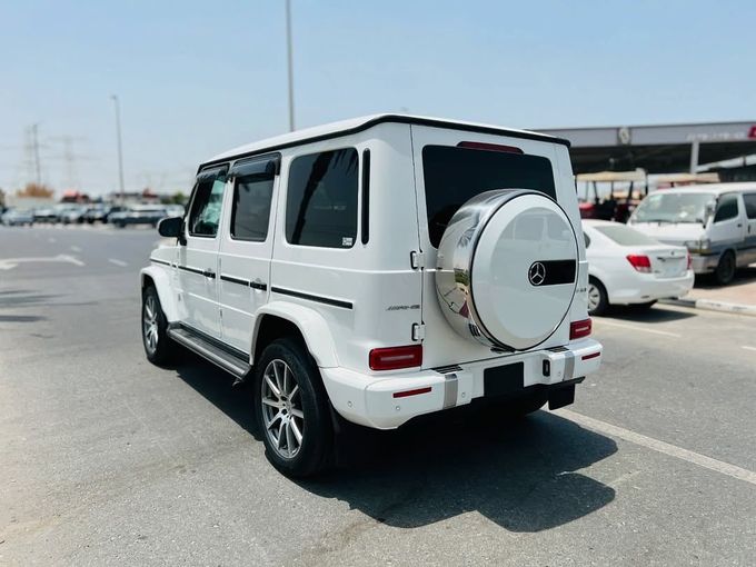 Подержанный Mercedes-Benz G-Class AMG 63 AMG II (W463), 4.0 л, 2019 в Дубае от Lakhani Motors Белый цвет. Японская | AUTO.AE