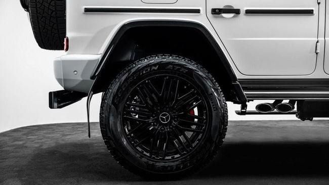 Подержанный Mercedes-Benz G-Class AMG 63 AMG II (W463), 4.0 л, 2023 в Дубае от Al Ain Class Motors Белый цвет. Европейская | AUTO.AE