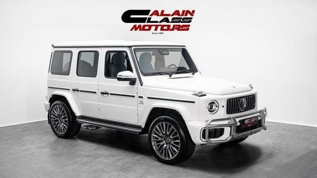 Used Mercedes-Benz G-Class AMG 63 AMG II (W465) Facelift, 4.0 l, 2025 in Dubai by Al Ain Class Motors, White color. GCC Specs | AUTO.AE