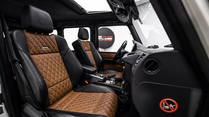 Used Mercedes-Benz G-Class AMG 65 AMG I (W463) Facelift 2, 6.0 l, 2014 in Dubai by Al Ain Class Motors, White color. GCC Specs | AUTO.AE