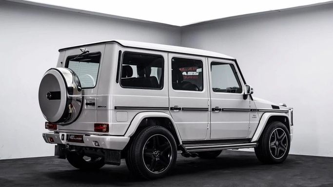 Used Mercedes-Benz G-Class AMG 65 AMG I (W463) Facelift 2, 6.0 l, 2014 in Dubai by Al Ain Class Motors, White color. GCC Specs | AUTO.AE