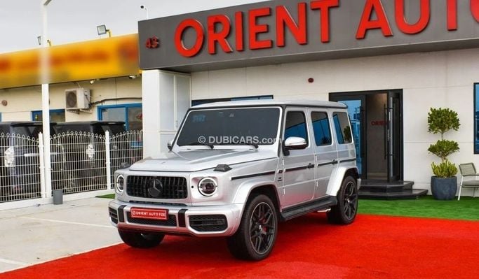 Новый Mercedes-Benz G-Class AMG 63 AMG II (W463), 4.0 л, 2023 в Дубае от Orient Auto FZE Серебристый цвет. Европейская | AUTO.AE