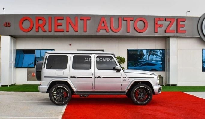 Новый Mercedes-Benz G-Class AMG 63 AMG II (W463), 4.0 л, 2023 в Дубае от Orient Auto FZE Серебристый цвет. Европейская | AUTO.AE