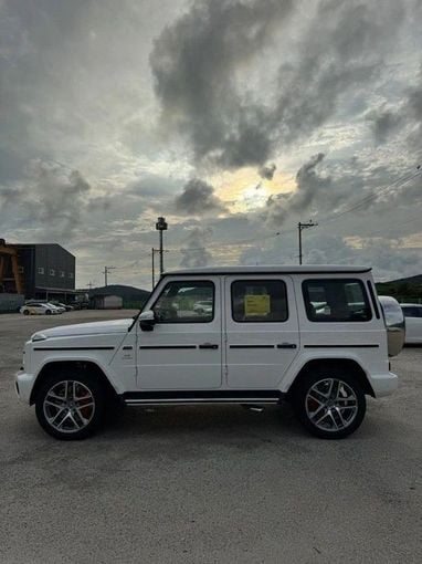 Новый Mercedes-Benz G-Class AMG 63 AMG II (W465) Рестайлинг, 4.0 л, 2025 в Дубае от Orient Auto FZE Белый цвет. Корейская | AUTO.AE