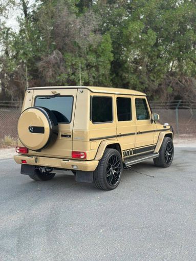 Подержанный Mercedes-Benz G-Class AMG 63 AMG I (W463) Рестайлинг 2, 5.5 л, 2015 в Дубае от Alzahiah Cars Золотистый цвет. GCC | AUTO.AE