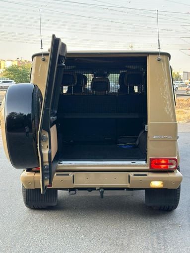 Подержанный Mercedes-Benz G-Class AMG 63 AMG I (W463) Рестайлинг 2, 5.5 л, 2015 в Дубае от Alzahiah Cars Золотистый цвет. GCC | AUTO.AE