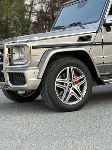 Подержанный Mercedes-Benz G-Class AMG 63 AMG I (W463) Рестайлинг 2, 5.5 л, 2014 в Дубае от Alzahiah Cars Серый цвет. GCC | AUTO.AE