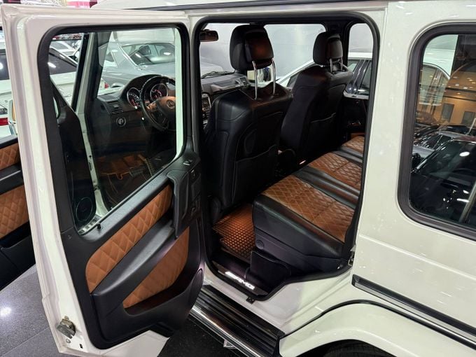 Подержанный Mercedes-Benz G-Class 550 II (W463) Рестайлинг 3, 5.5 л, 2014 в Дубае от STAR COLLECTION LLC Белый цвет. GCC | AUTO.AE