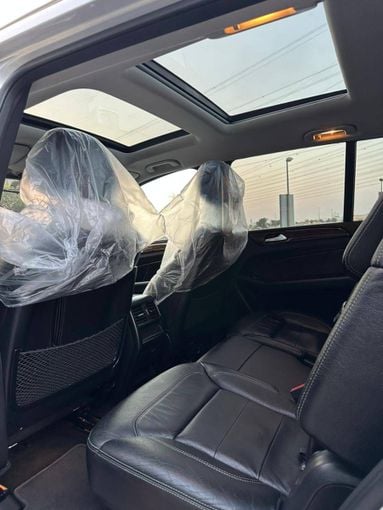 Подержанный Mercedes-Benz GL-Class 450 II (X166), 3.0 л, 2016 в Дубае от Alzahiah Cars Серебристый цвет. Американская | AUTO.AE