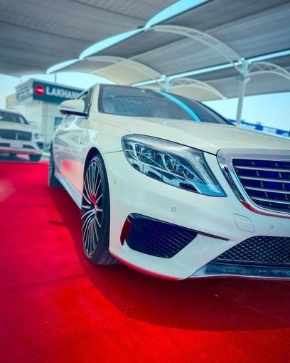 Used Mercedes-Benz S-Class AMG 63 AMG III (W222, C217), 5.5 l, 2015 in Dubai by Lakhani Motors, White color. Japanese Specs | AUTO.AE