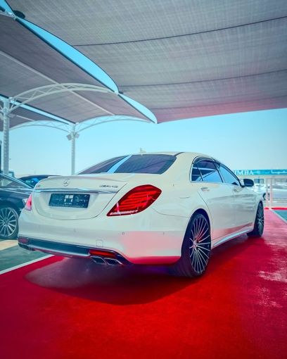 Used Mercedes-Benz S-Class AMG 63 AMG III (W222, C217), 5.5 l, 2015 in Dubai by Lakhani Motors, White color. Japanese Specs | AUTO.AE