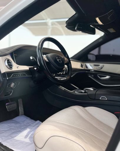Used Mercedes-Benz S-Class AMG 63 AMG III (W222, C217), 5.5 l, 2015 in Dubai by Lakhani Motors, White color. Japanese Specs | AUTO.AE