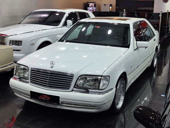 Used Mercedes-Benz S-Class III (W140) Facelift, 6.0 l, 1998 in Dubai by STAR COLLECTION LLC, White color. Japanese Specs | AUTO.AE