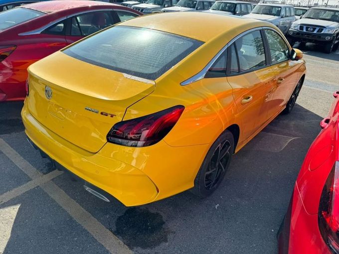 New MG 5 II, 1.5 l, 2024 in Dubai by Mohamed Hakim Motors, Yellow color. Other | AUTO.AE