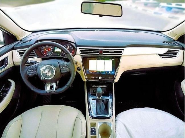 New MG 5 I Facelift, 1.5 l, 2023 in Dubai by Soltan Auto, White color. GCC Specs | AUTO.AE