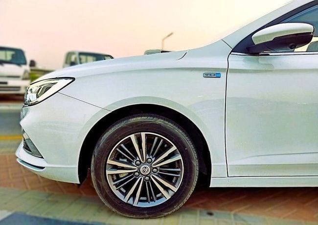New MG 5 I Facelift, 1.5 l, 2023 in Dubai by Soltan Auto, White color. GCC Specs | AUTO.AE