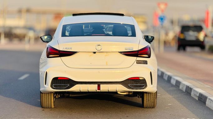New MG 5 II Facelift, 1.5 l, 2025 in Dubai by MENAMOTORS, White color. Chinese Specs | AUTO.AE