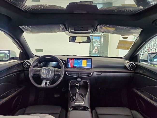 New MG 5 II Facelift, 1.5 l, 2025 in Dubai by Gulf Motors, White color. Chinese Specs | AUTO.AE