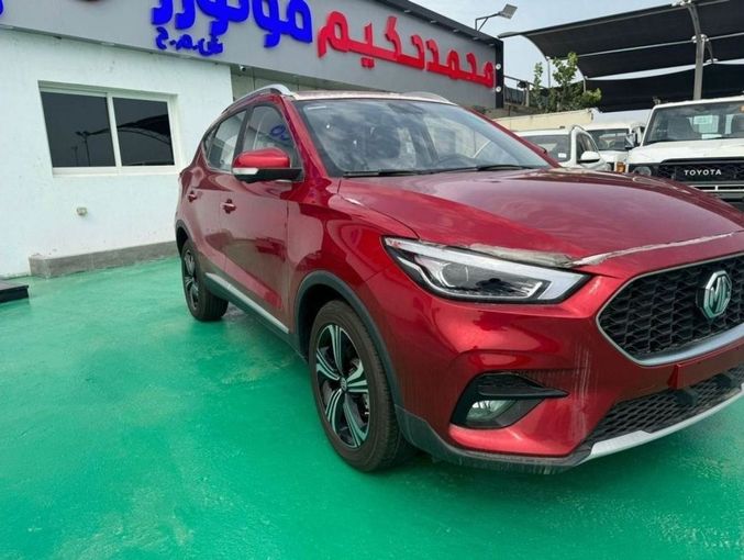 New MG ZS II Facelift, 1.5 l, 2024 in Dubai by Mohamed Hakim Motors, Red color. GCC Specs | AUTO.AE