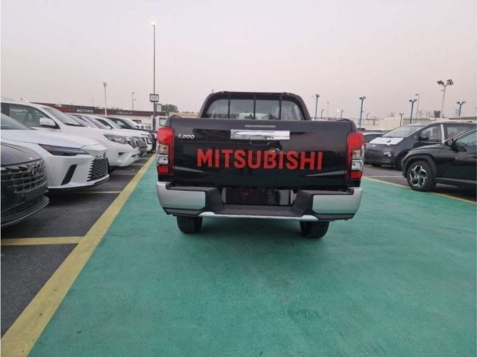 New Mitsubishi L200 V Facelift, 2.4 l, 2023 in Dubai by Mohamed Hakim Motors, Black color. GCC Specs | AUTO.AE