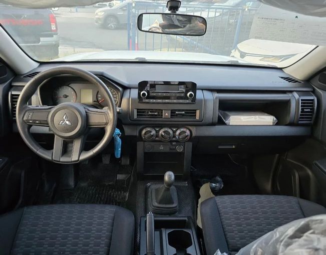 New Mitsubishi L200 VI, 2.4 l, 2024 in Dubai by Mohamed Hakim Motors, White color. Other | AUTO.AE