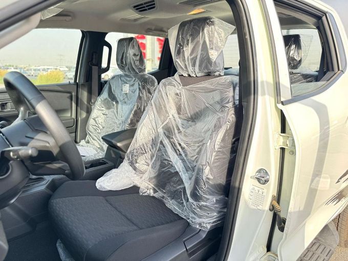 New Mitsubishi L200 VI, 2.4 l, 2025 in Dubai by Mohamed Hakim Motors, White color. GCC Specs | AUTO.AE