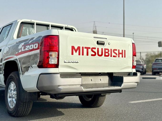New Mitsubishi L200 VI, 2.4 l, 2025 in Dubai by Mohamed Hakim Motors, White color. GCC Specs | AUTO.AE