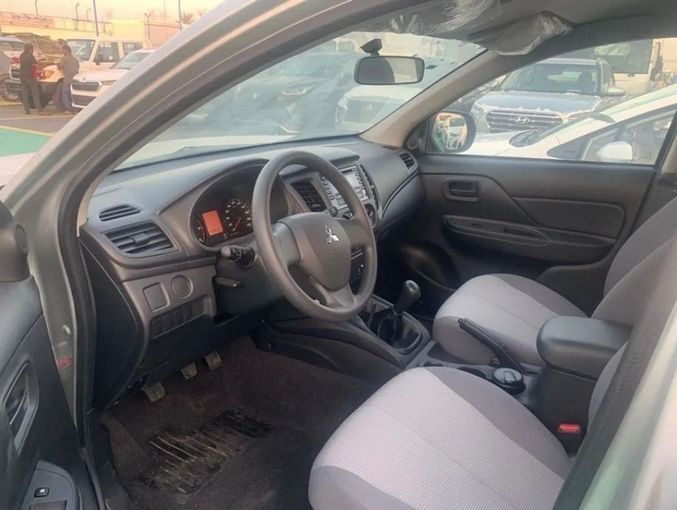 New Mitsubishi L200 V Facelift, 2.4 l, 2023 in Dubai by Mohamed Hakim Motors, Silver color. GCC Specs | AUTO.AE