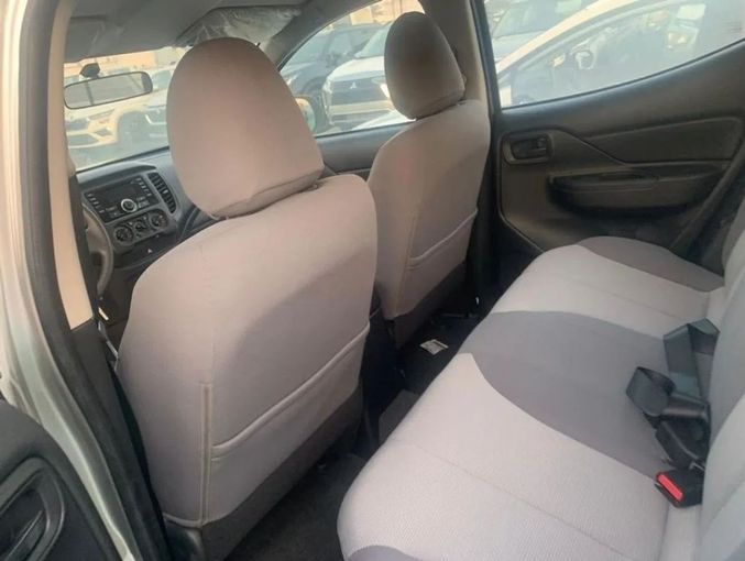 New Mitsubishi L200 V Facelift, 2.4 l, 2023 in Dubai by Mohamed Hakim Motors, Silver color. GCC Specs | AUTO.AE