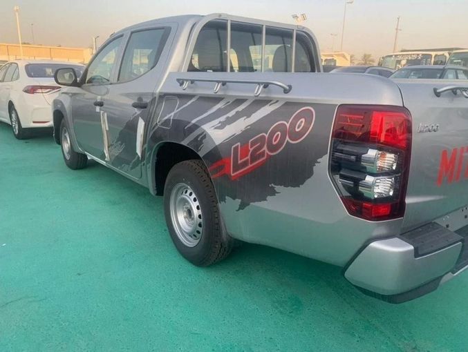 New Mitsubishi L200 V Facelift, 2.4 l, 2023 in Dubai by Mohamed Hakim Motors, Silver color. GCC Specs | AUTO.AE