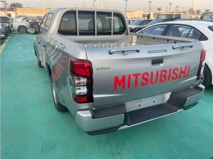 New Mitsubishi L200 V Facelift, 2.4 l, 2023 in Dubai by Mohamed Hakim Motors, Silver color. GCC Specs | AUTO.AE