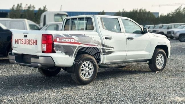 Новый Mitsubishi L200 V Рестайлинг, 2.4 л, 2024 в Дубае от Falcons GT Motors FZCO Белый цвет. GCC | AUTO.AE