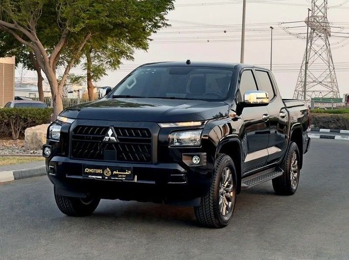 New Mitsubishi L200 VI, 2.4 l, 2025 in Dubai by Q Motors, Black color. GCC Specs | AUTO.AE