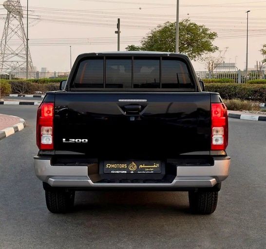 New Mitsubishi L200 VI, 2.4 l, 2025 in Dubai by Q Motors, Black color. GCC Specs | AUTO.AE