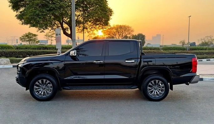 New Mitsubishi L200 VI, 2.4 l, 2025 in Dubai by Q Motors, Black color. GCC Specs | AUTO.AE