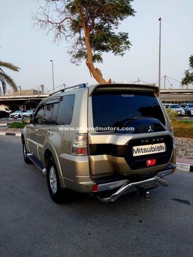 Used Mitsubishi Pajero IV Facelift 2, 3.5 l, 2015 in Dubai by Alhamd Motors, Golden color. GCC Specs | AUTO.AE