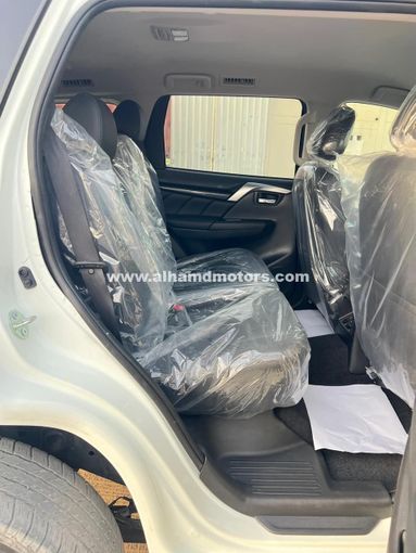 Used Mitsubishi Pajero Sport III, 2.4 l, 2018 in Dubai by Alhamd Motors, White color. Other | AUTO.AE