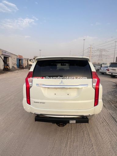 Used Mitsubishi Pajero Sport III, 2.4 l, 2018 in Dubai by Alhamd Motors, White color. Other | AUTO.AE