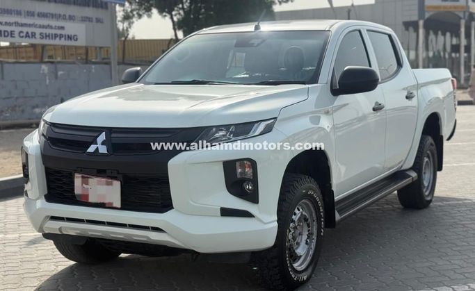 Подержанный Mitsubishi Triton V Рестайлинг, 2.4 л, 2023 в Дубае от Alhamd Motors Белый цвет. Other | AUTO.AE