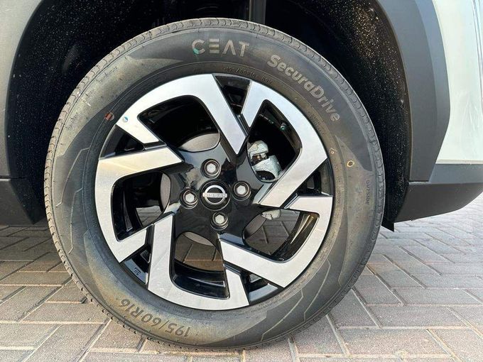 New Nissan Magnite I, 1.0 l, 2023 in Dubai by MENAMOTORS, White color. Other | AUTO.AE