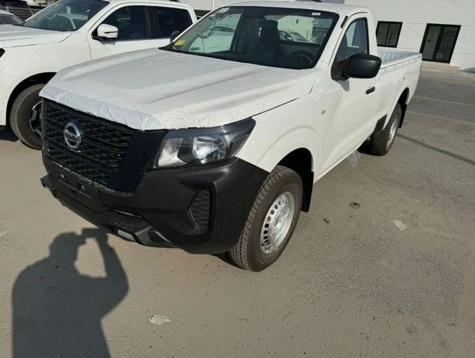 New Nissan Navara (Frontier) IV (D23), 2.5 l, 2023 in Dubai by Mohamed Hakim Motors, White color. GCC Specs | AUTO.AE